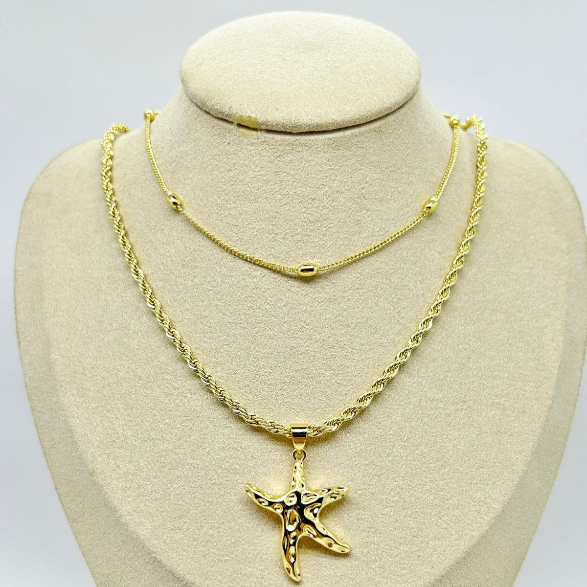 COLLAR DOBLE CON DIJE ESTRELLA