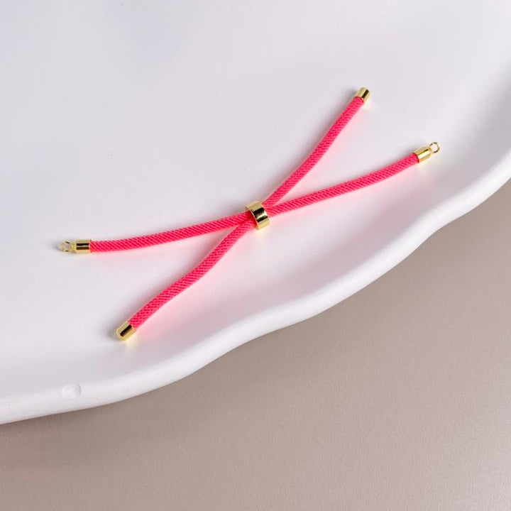 PULSERA DE ENSAMBLE CORDON FUCSIA FLORECENTE