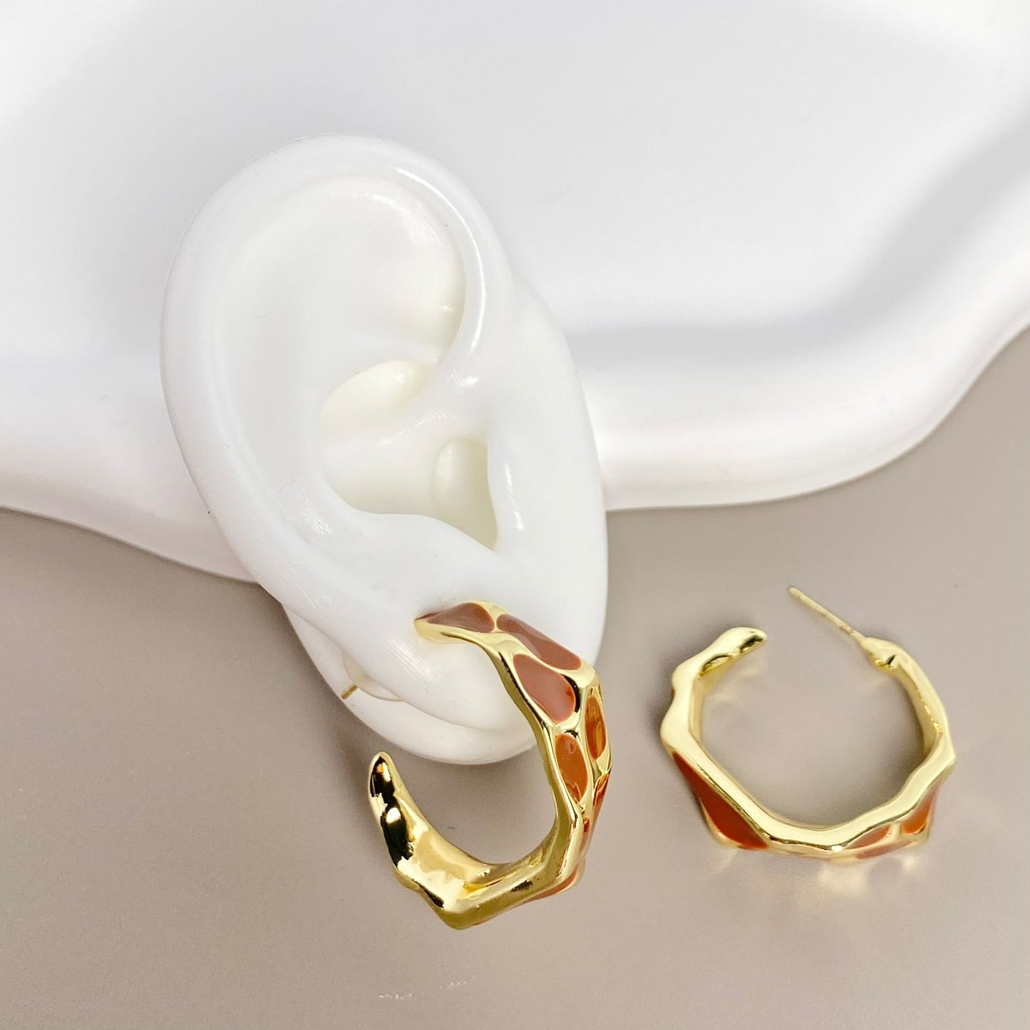 ARETE ANIMAL PRINT CAFE