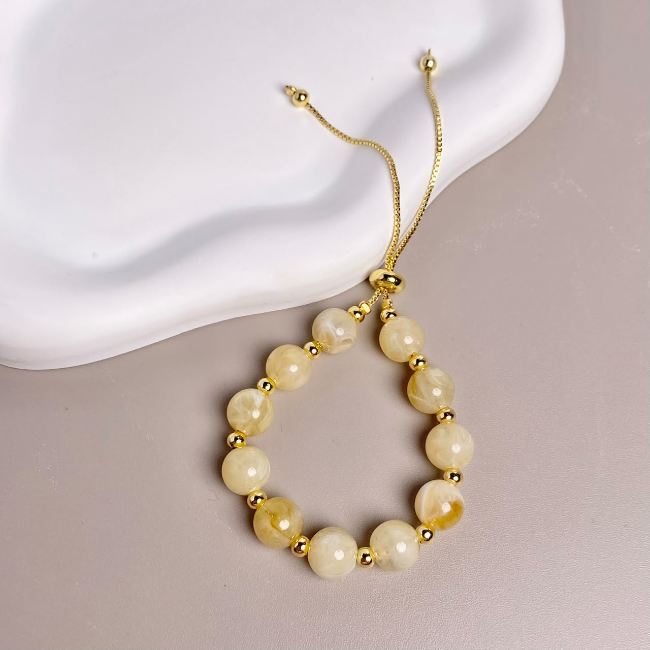 PULSERA BEIGE
