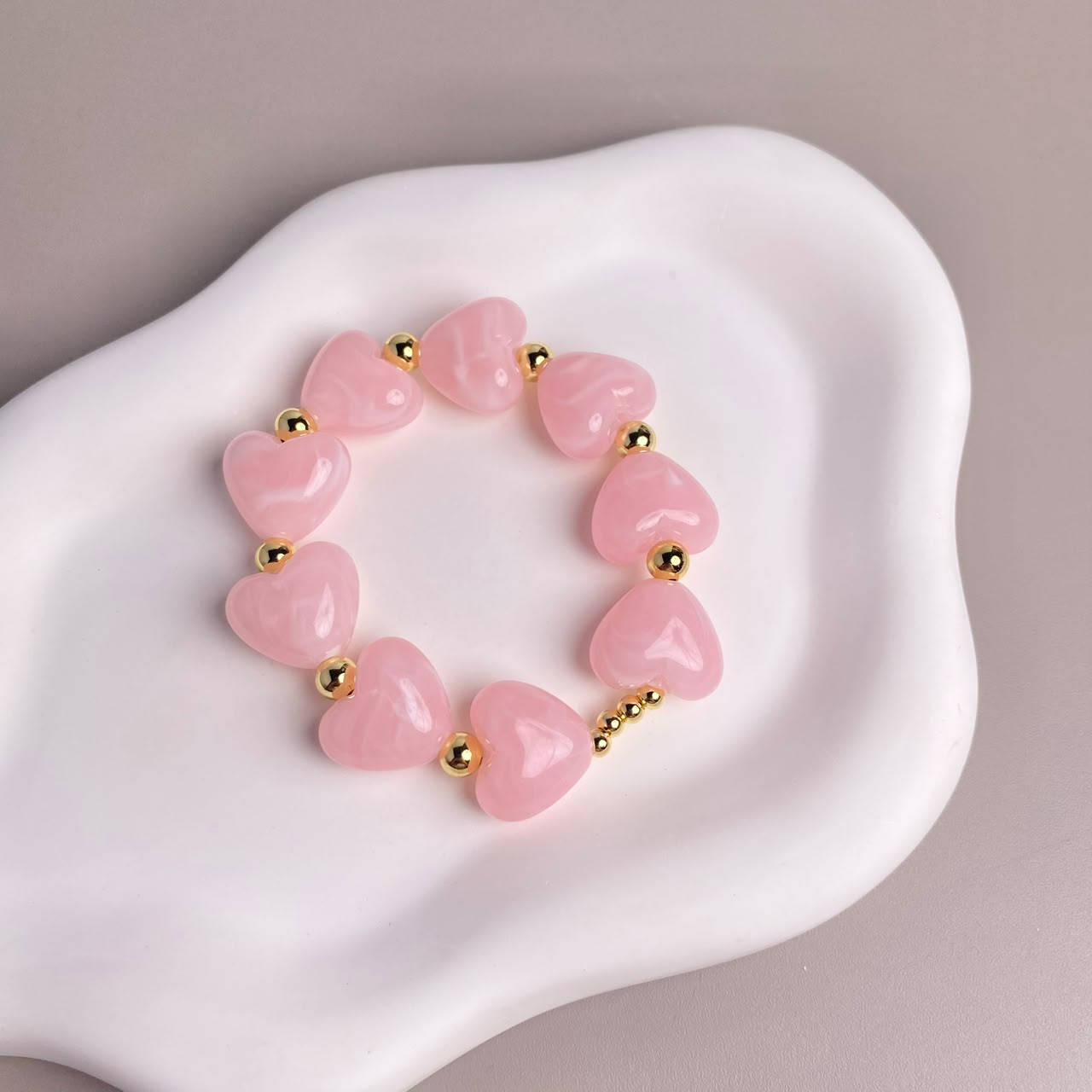 PULSERA CORAZONES ROSADOS