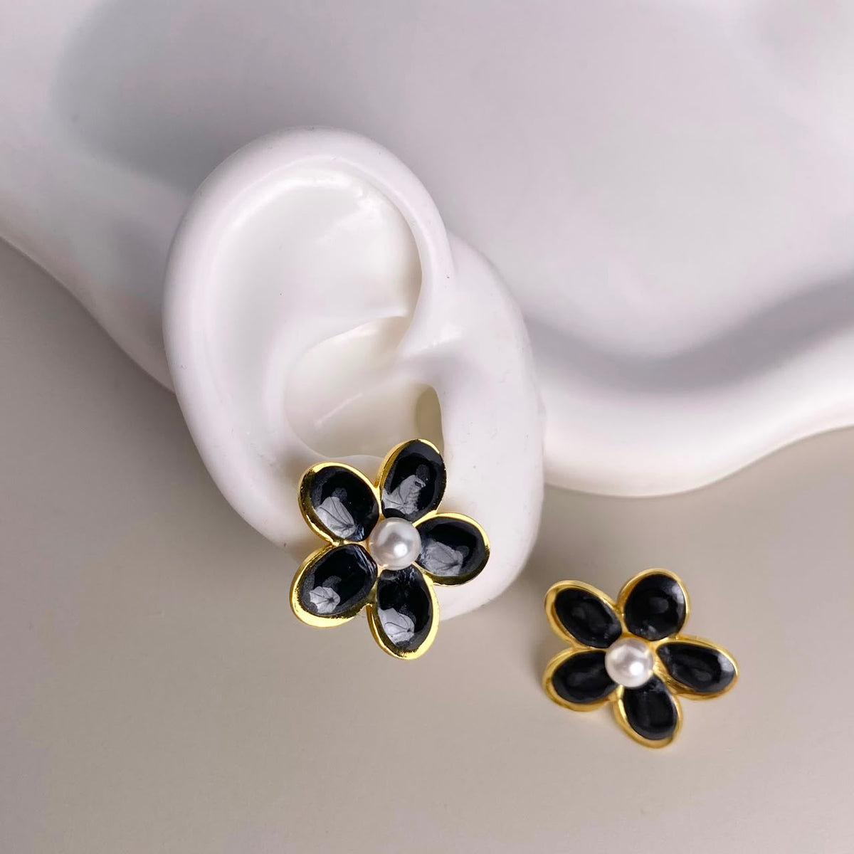 ARETES FLOR