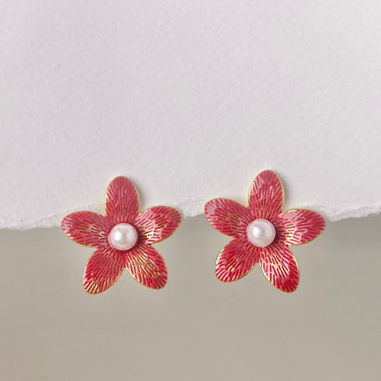 ARETE FLOR FUCSIA CON PERLA