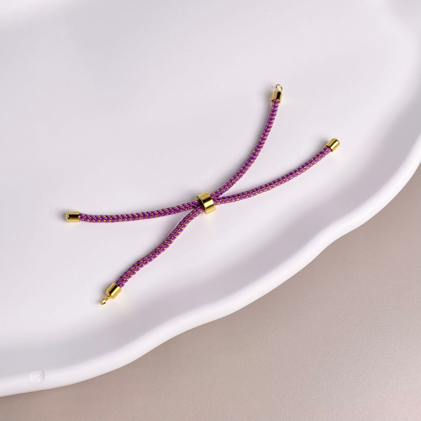 PULSERA DE ENSAMBLE CORDON MORADO