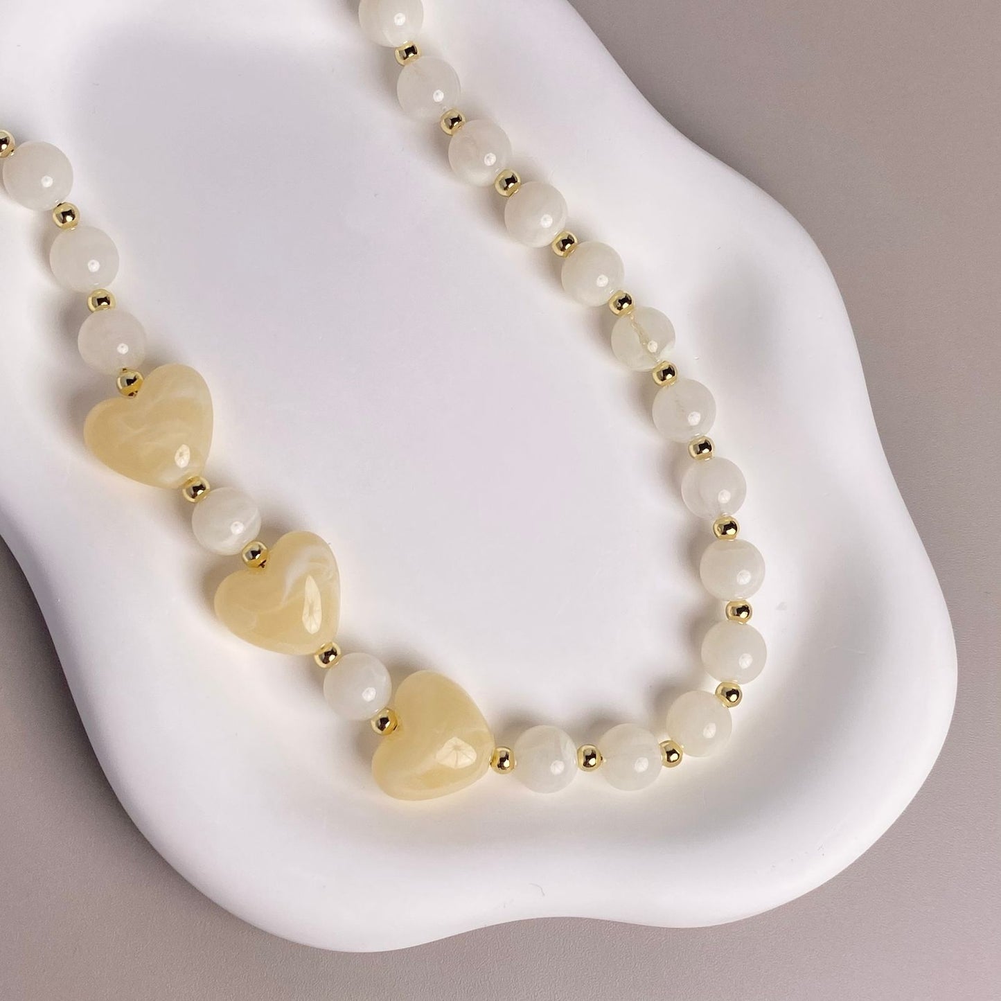 COLLAR CORAZONES BEIGE
