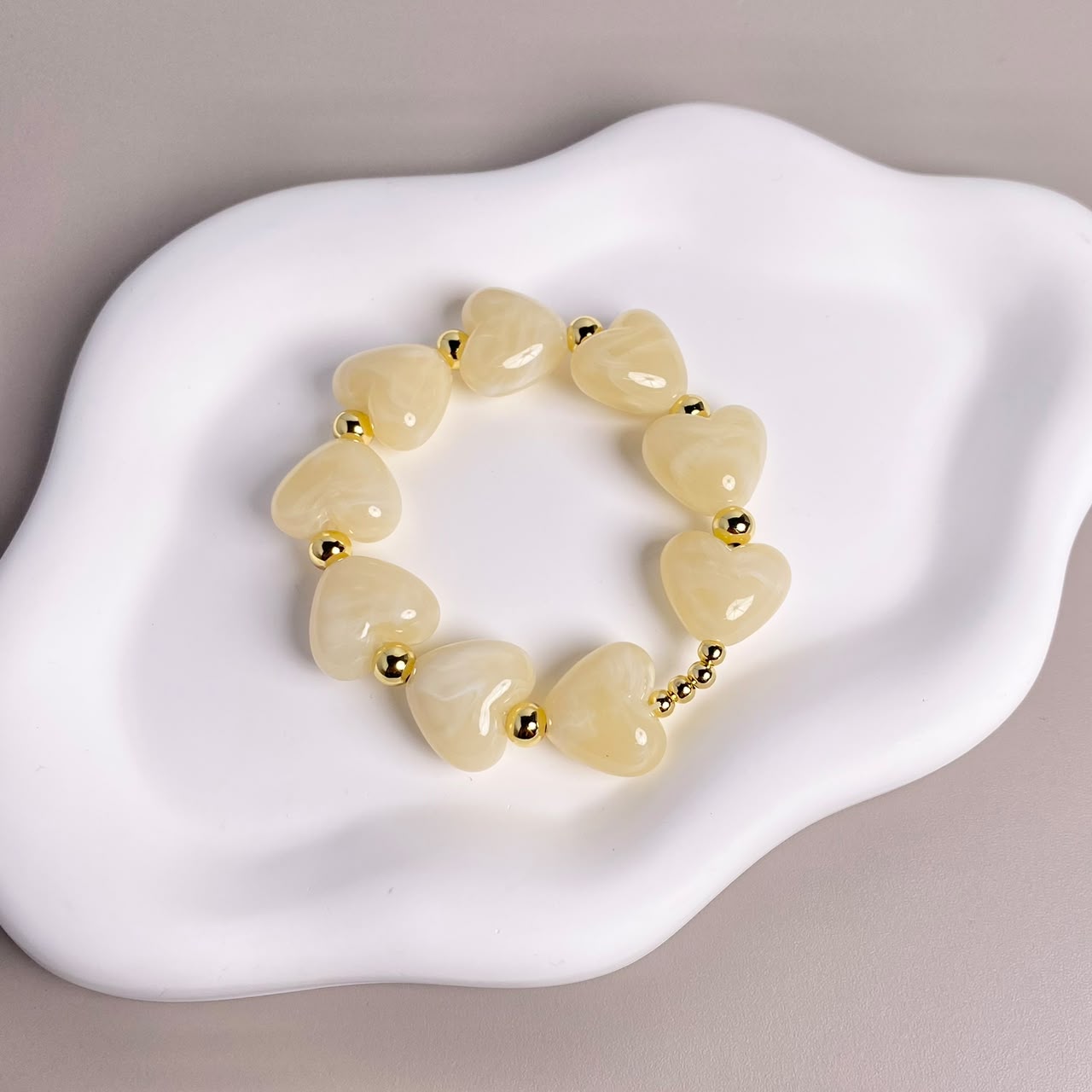 PULSERA CORAZON BEIGE