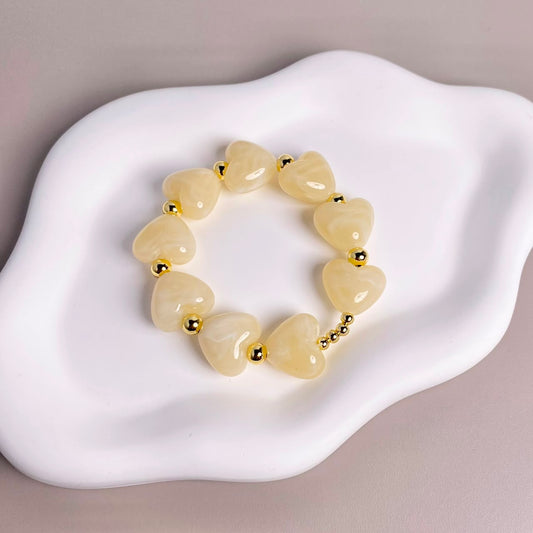 PULSERA CORAZON BEIGE