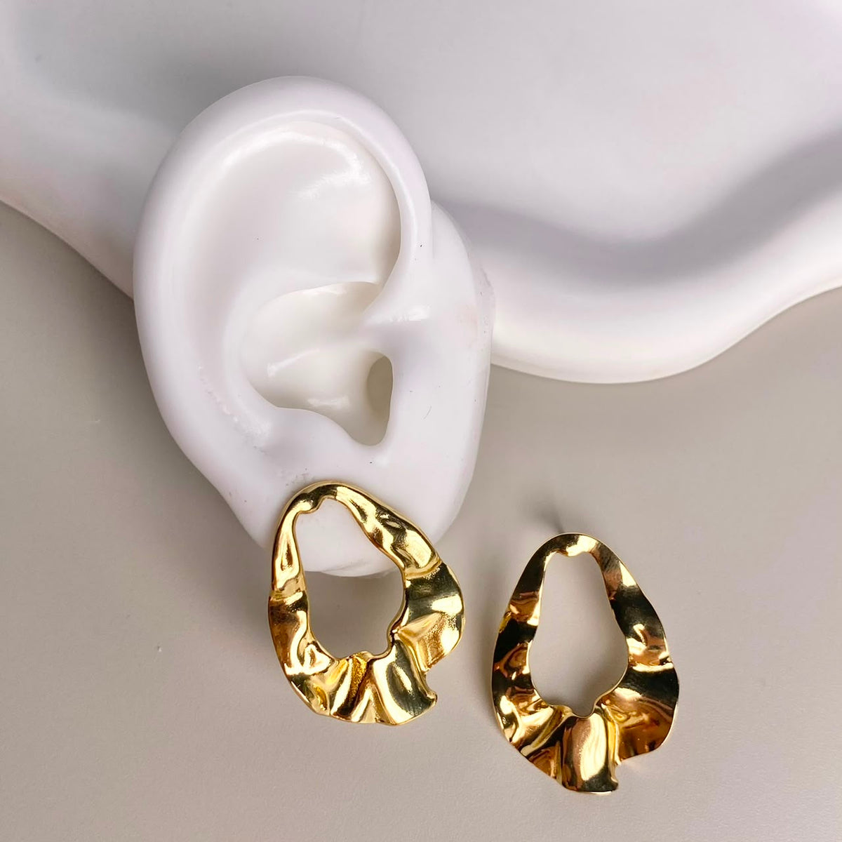 ARETES DORADO