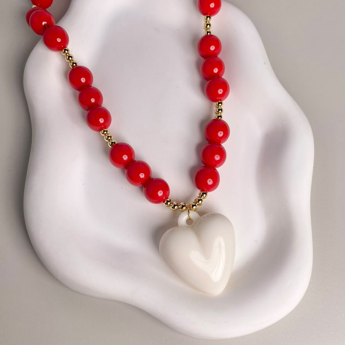COLLAR ABACO ROJO